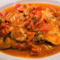Veal Pizzaiola · Sautéed veal scalloppini in a light marinara sauce with a touch of oregano.