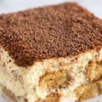 Homemade Tiramisu · Coffee flavored Italian dessert, ladyfingers dipped in coffee, layered with a mixture of egg...