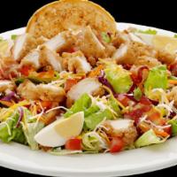Caesar Salad With Grilled Chicken · Lettuce, Parmesan cheese, croutons, and grilled chicken.