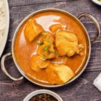 Murgh Curry · Premium boneless chicken cooked in specially prepared sauce made with different Himalayan he...