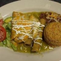 Flautas Combo · Four crispy chicken taquitos, topped with lettuce, sour cream, pico de gallo sprinkled with ...
