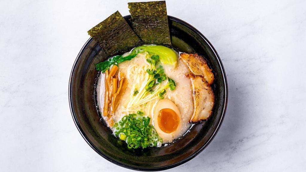 Tonkotsu Ramen · Thin noodle with pork broth, chashu, green onion, boiled egg, menma, seaweed.