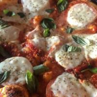 Margherita · Fresh mozzarella, tomato & basil with garlic