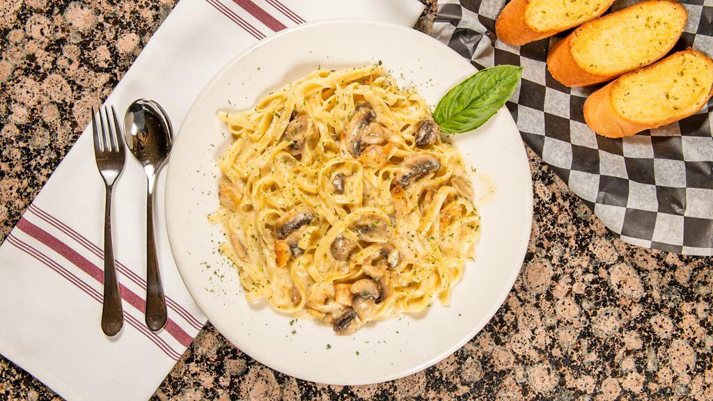 *New* Chicken Portofino · Fettuccine with chicken & a creamy Alfredo sauce with mushrooms