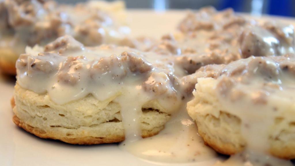 Biscuits & Gravy · Country gravy over fluffy biscuits. Choice of bacon, sausage or ham.