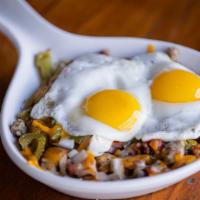 Meat Lovers Skillet · Two eggs any style with ham, bacon, sausage, onions & peppers. Topped with melted monterrey ...