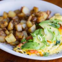 Blue Spring Omelette · Blue cheese crumbles, cheddar cheese, spinach & mushrooms. Topped with avocado, tomato and g...