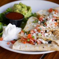 Grilled Quesadilla · Choice of pulled pork, chicken or ground beef on flour tortilla with black beans, corn, mont...