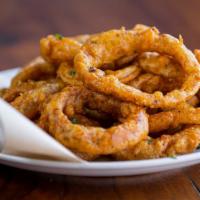 Ipa Onion Rings · Sliced fresh sweet onions rings hand dipped in IPA beer batter and served golden brown.