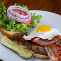 Georgie'S Signature Burger · Lettuce, tomato, onion, ham, smoked bacon, fried egg, 2 kinds of cheese & 1000 island.