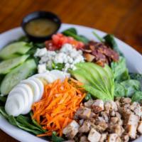 Cobb Salad · Smoked chicken, bacon, carrots, cucumbers, avocado, hard boiled egg, tomatoes & blue cheese ...