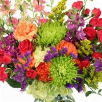 Colorful Blooms · Send an arrangement as colorful and vibrant as them! With purple stock, green Fuji mums, ora...