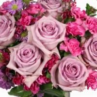 Lavender Luxury · They'll love getting this luscious bouquet! Featuring lavender roses, fuchsia mini carnation...