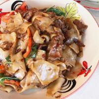 Drunken Noodle · Medium. Choices of meat stir-fried with wide rice noodle, tomatoes, basil, onion, and sweet ...