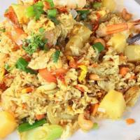Thai Fried Rice · Choices of meat stir-fried with jasmine rice, onion, scallion, tomatoes, carrot and egg in c...