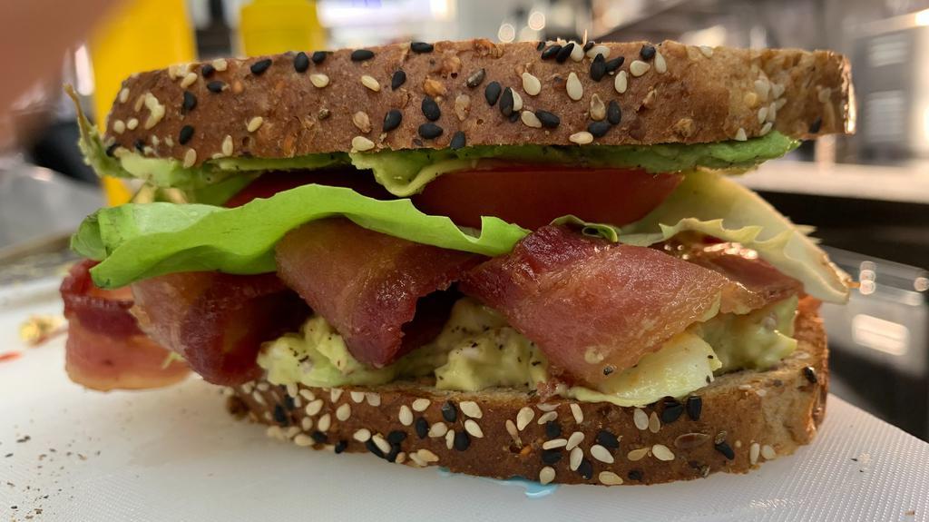 Bltae · Bacon, Organic  lettuce, Organic tomato, house made avocado spread mixed with diced hard boiled eggs, stoneground mustard and soy free mayo on organic 24 grain bread.