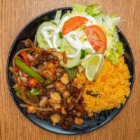 Fajita Mixta · Grilled steak and chicken , four jumbo shrimp, green pepper, red pepper, and onions. Served ...