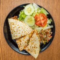 Chicken Breast Quesadilla · Served with sour cream and house salad.