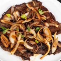 Bistec Encebollado · Thin Cut Steak Cooked With Onions and peppers. Served with your side of choice. Beans includ...