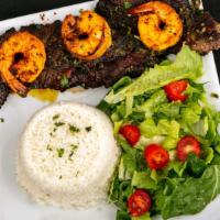 Surf And Turf · Churrasco Steak topped with Shrimp and your side of choice