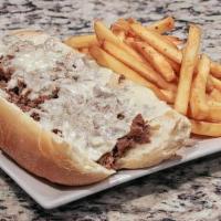 Steak And Cheese Sub With Fries · Shaved Steak with Mayo, lettuce and Cheese.