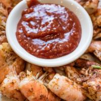 Steamed Shrimp · 26-30 count premium domestic shrimp steamed with Old Bay seasoning.