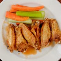 Hellas Wings · Deep fried chicken wings in your choice of sauce, served with celery sticks and blue cheese ...