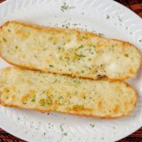 Cheesy Garlic Bread · Chopped garlic, shredded Mozzarella cheese and spices.