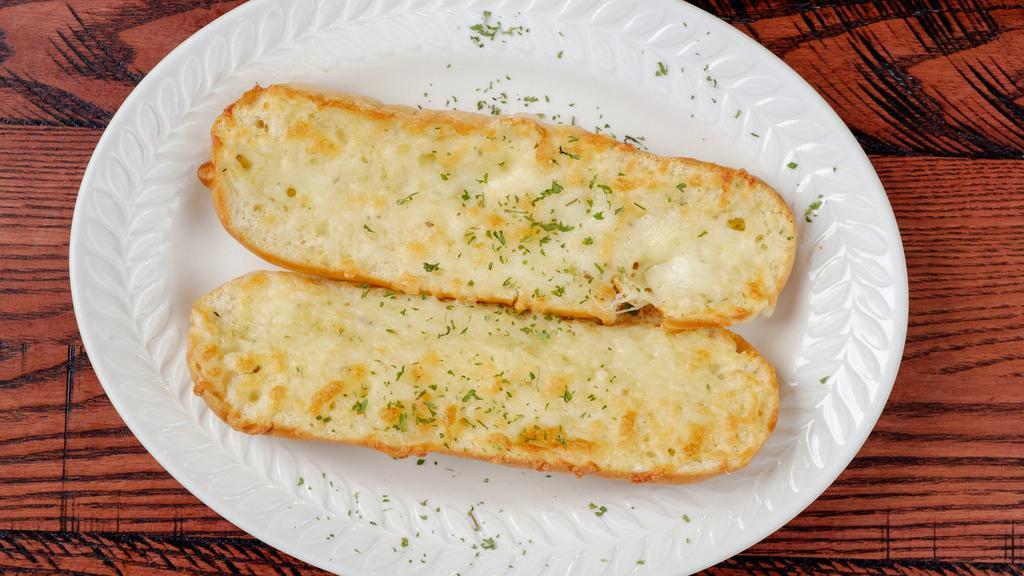 Cheesy Garlic Bread · Chopped garlic, shredded Mozzarella cheese and spices.