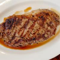 Ribeye Steak · 16-20 Oz. well marbled rib-eye, hand cut and flame broiled. Served with your choice of 2 sid...