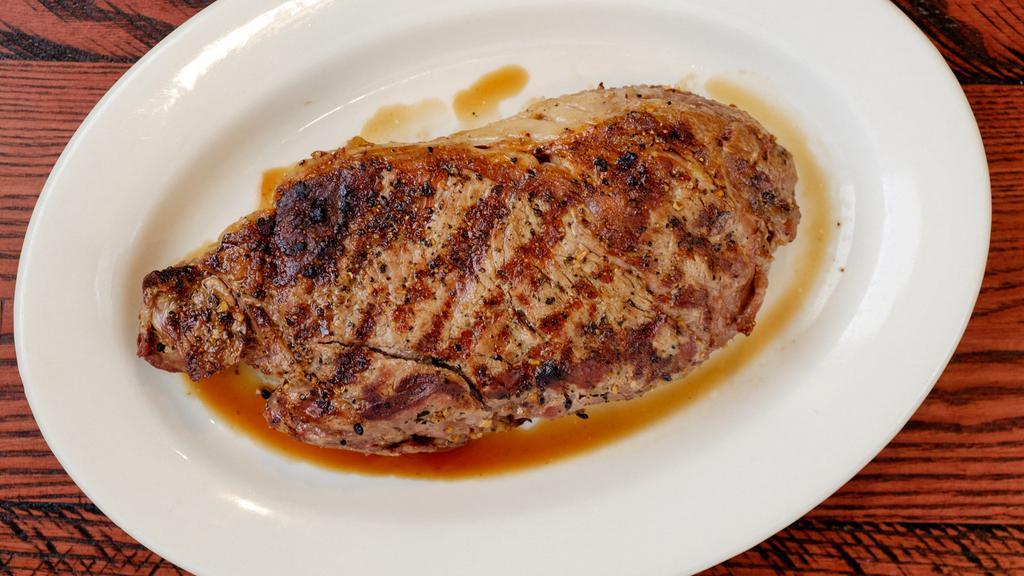 Ribeye Steak · 16-20 Oz. well marbled rib-eye, hand cut and flame broiled. Served with your choice of 2 side items.