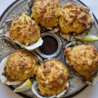 Stuffed Oyster Platter · Half dozen jumbo oysters stuffed with heaping mounds of jumbo lump crab cake. Served with yo...