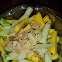 Ensalada De Mango · Mango, apple, Manchego salad with toasted almond and balsamic dressing.