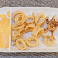 Calamares Fritos · Deep fried calamari in our Guardado's special recipe tomato-alioli.
