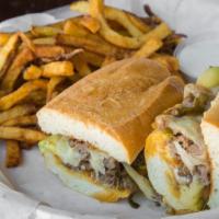 Fm Cheesesteak · Sliced ribeye in provolone cheese with grilled onion, grilled jalapeno, avocado and mayo. Se...