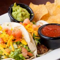 Chicken Tacos (2) · Grilled chicken, lettuce, tomato, taco sauce and cheddar cheese