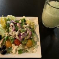 Greek Salad · A mixture of fresh iceberg amd romaine lettuce, tomatoes, cucumbers, bell peppers and onions...