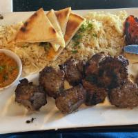 Beef Kabab · Grilled beef filet mignon skewer marinated in special home-made sauce. Served with grilled t...