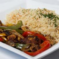 Mediterranean Chicken Fajita · Grilled chicken breast with onion and bell peppers served with a bed of vermicelli rice.
