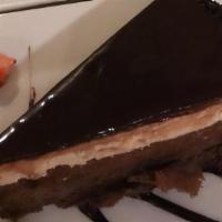 Chocolate Temptation (Cake) · Layers of chocolate cake filled with chocolate and hazelnut creams and hazelnut crunch