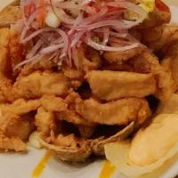 Jalea · A crispy mixture of deep-fried seafood served with yucca and our creamy tartar sauce.