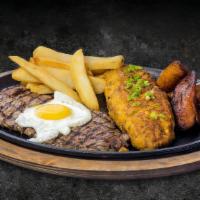 Tacu Tacu A Lo Pobre · A delicious 8oz steak on the grill served with plantains, French fries, Tacu Tacu, and toppe...