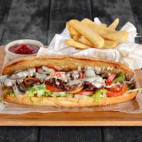 Steak & Cheese · Rib eye steak grilled with onions, peppers, topped with provolone or American cheese.