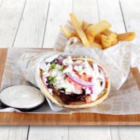 Gyro De Picca · Lamb or Chicken thinly sliced and wrapped in pita bread with tzatziki sauce and feta cheese.