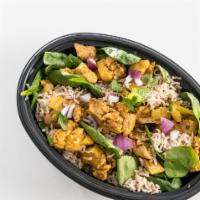 Andhra Chicken Bowl · Chicken cooked in cardamom, cloves, cinnamon, turmeric, and chili.