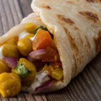 Channa Masala Wrap · Vegan, vegetarian. Contains the following: gluten, soy. Chickpeas stewed in garlic, ginger, ...