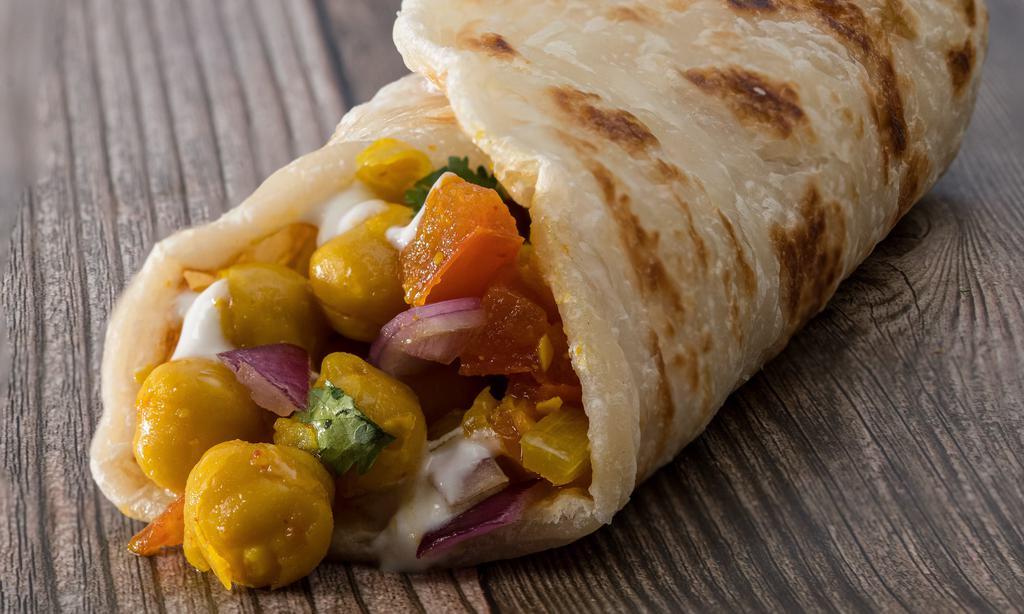 Channa Masala Wrap · Vegan, vegetarian. Contains the following: gluten, soy. Chickpeas stewed in garlic, ginger, coriander, turmeric, chili, and cumin.