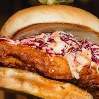 Atx Hot Chicken · A local fave!!! . crispy chicken, red chili sauce, shredded lettuce, house pickles and spicy...