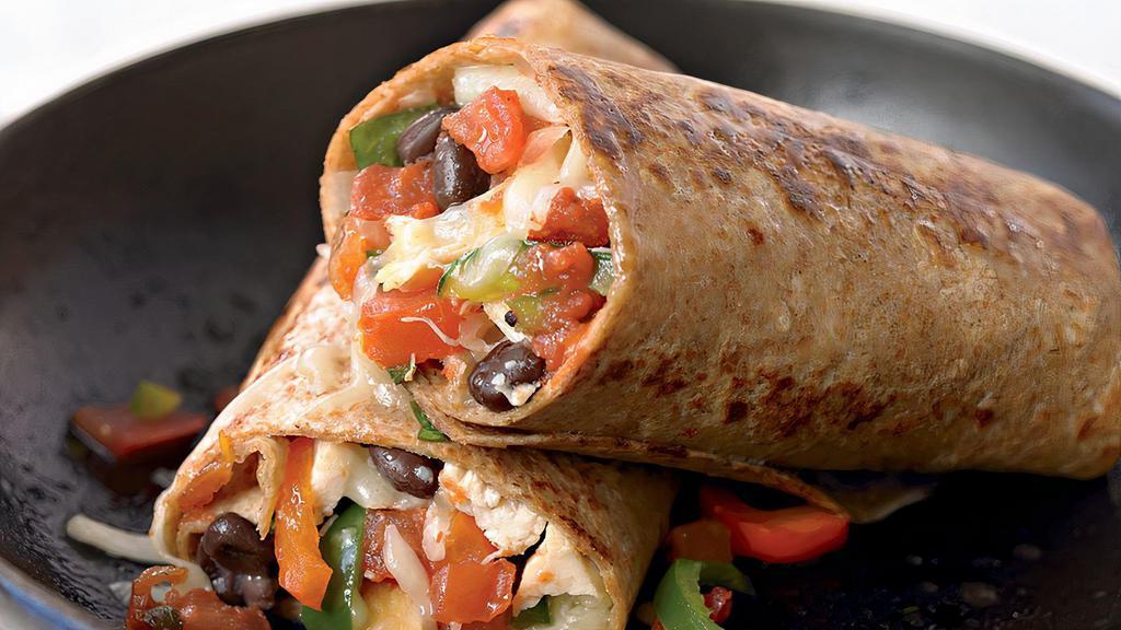 Fajita Burritos · Fresh, hot large flour tortilla with your choice of meat sauteed with onions and peppers. Filled with rice, refried beans, lettuce, tomato, sour cream and guacamole