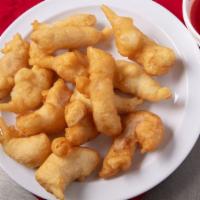 Sweet And Sour Chicken · Breast of deep fried in batter served with a classic sweet and sour sauce. Served with white...